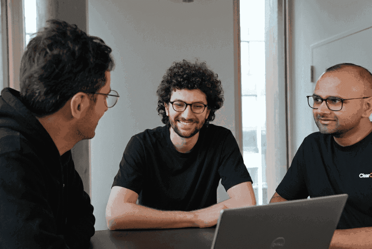 ClearOps colleagues discussing product ideas